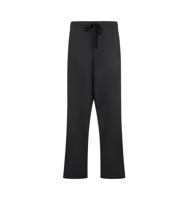 Image 1 of 3 - BLACK - Fear of God Essentials Mens Pleat Front Drawstring Pants are crafted from cotton canvas. Feature a relaxed fit with a relaxed leg and seat, front pleats, elasticized waistband with heavyweight drawstring, side-seam pockets, back welt pockets, and an Essentials signature label. Main Material: 100% Cotton Canvas.