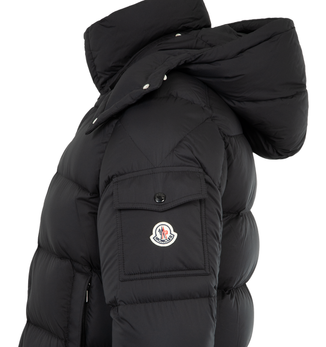 Image 4 of 5 - BLACK - MONCLER Vezere Short Down Jacket featuring recycled longue saison, nylon lger brillant lining, down-filled, detachable and adjustable hood, zipper and snap button closure, zipped pockets, patch pocket on the sleeve, adjustable cuffs and hem with drawstring fastening. 100% polyamide/nylon. Padding: 90% down, 10% feather.
