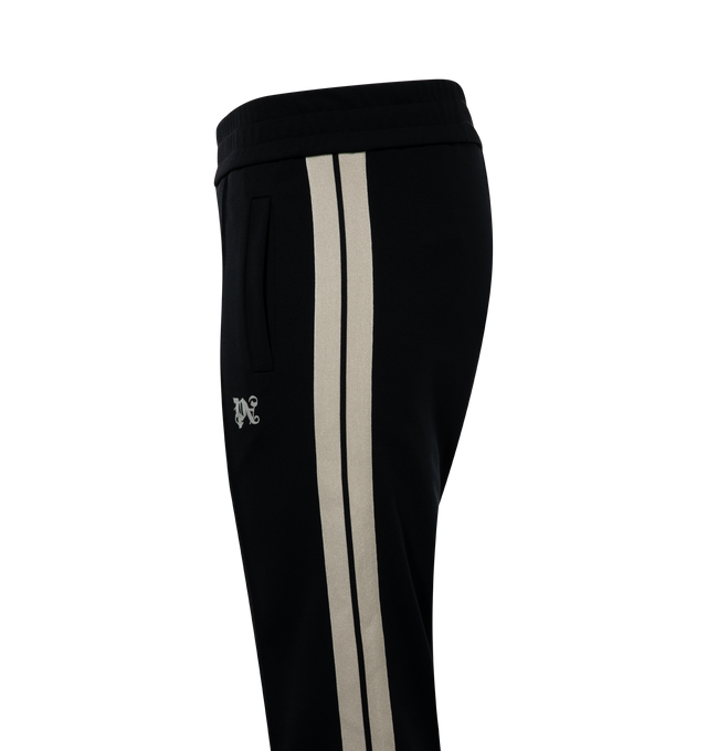 Image 3 of 3 - BLACK - PALM ANGELS Monogram Track Pants featuring elasticized waistband, two-pocket styling, logo embroidered at front, pinched seams at front, zip vent at cuffs and striped trim at outseams. 100% recycled polyester. Made in Italy. 