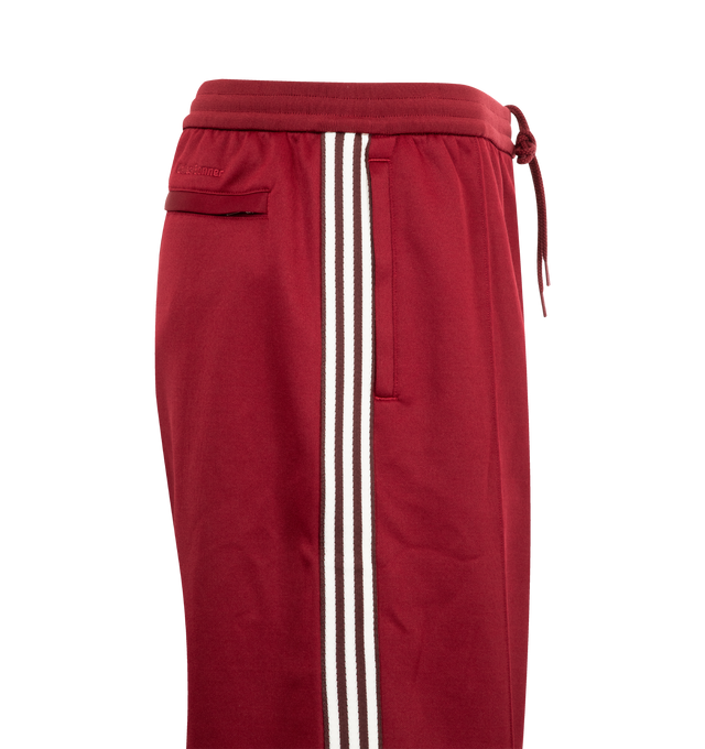 Image 3 of 3 - RED - Adidas x Wales Bonner Track Shorts featuring loose fit, drawcord on elastic waist and side zip pockets. 61% polyester, 39% cotton.