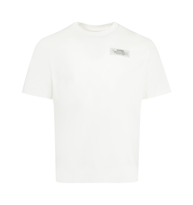 Image 1 of 2 - WHITE - AMIRI Spirit T-Shirt featuring stretch cotton jersey, rib knit crewneck, logo at chest, graphic on back and dropped shoulders. Cotton. Made in Italy.