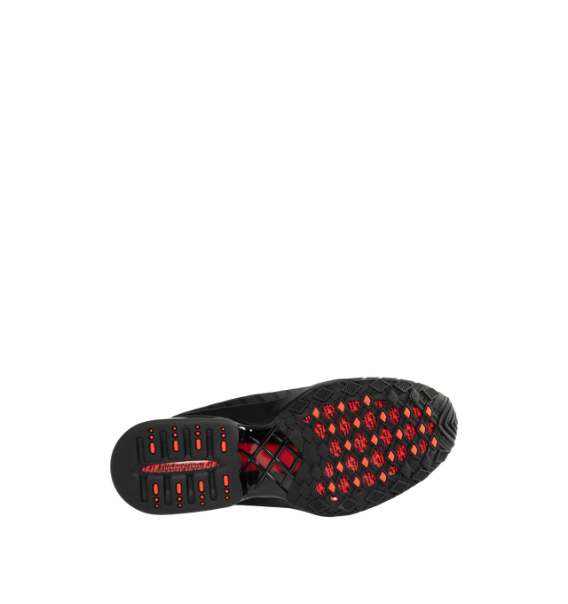 Image 4 of 5 - BLACK - Nike Women's Air Max Dolce Shoes revive an iconic silhouette that seamlessly transitions from casual everyday wear to elevated styling. Originally rooted in performance running, this distinctive design retains the signature details that made it a standout within the Air Max family, including a laceless molded upper, supportive overlay cage, and visible Max Air cushioning in the heel. Finished with a foam midsole for enhanced comfort, the Air Max Dolce delivers lightweight cushioning a