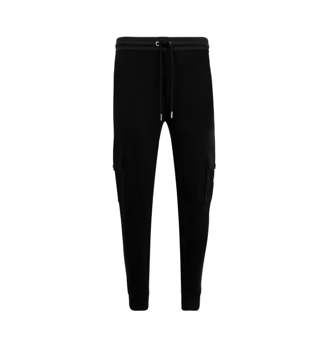 Image 1 of 3 - BLACK - MONCLER Cotton Blend Sweatpants featuring cotton blend fleece, nylon waistband with drawstring fastening, nylon cargo pockets with zipper and snap button closure and rib knit cuffs. 87% cotton, 13% polyamide/nylon. Made in Turkey.