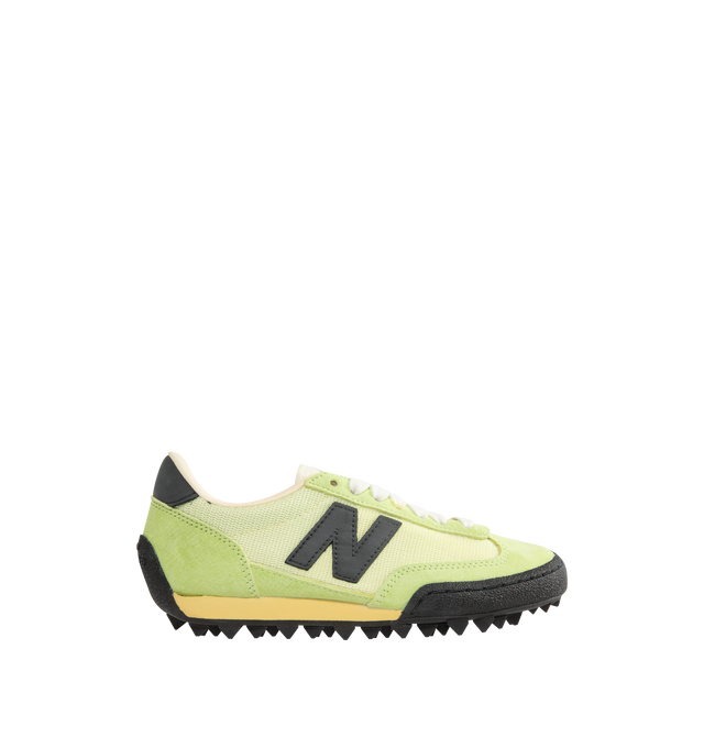 Image 1 of 5 - GREEN - NEW BALANCE UGTR5T9 featuring debossed crocodile print, eighties turf-inspired design, rubber outsole with treads, 'N' logo, leather upper and rubber outsole.