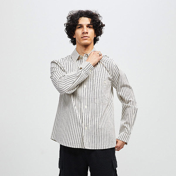 Man wearing LITE YEAR Relaxed Button Up Shirt in Japanese type writer stripe washed cotton