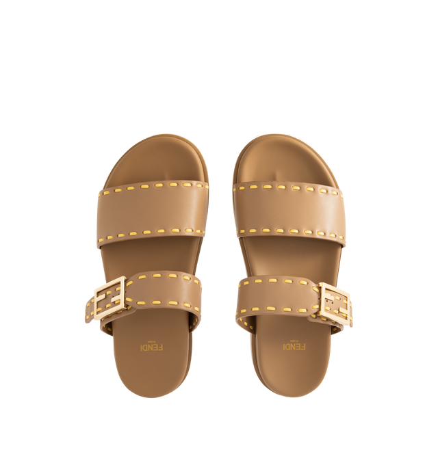 Image 4 of 4 - BROWN - FENDI Feel Slide Sandal featuring double-band flat slides with FF Baguette decorative buckle, hand-sewn contrasting macro Selleria topstitches and gold-finish metalware. 100% calfskin. Made in Italy.