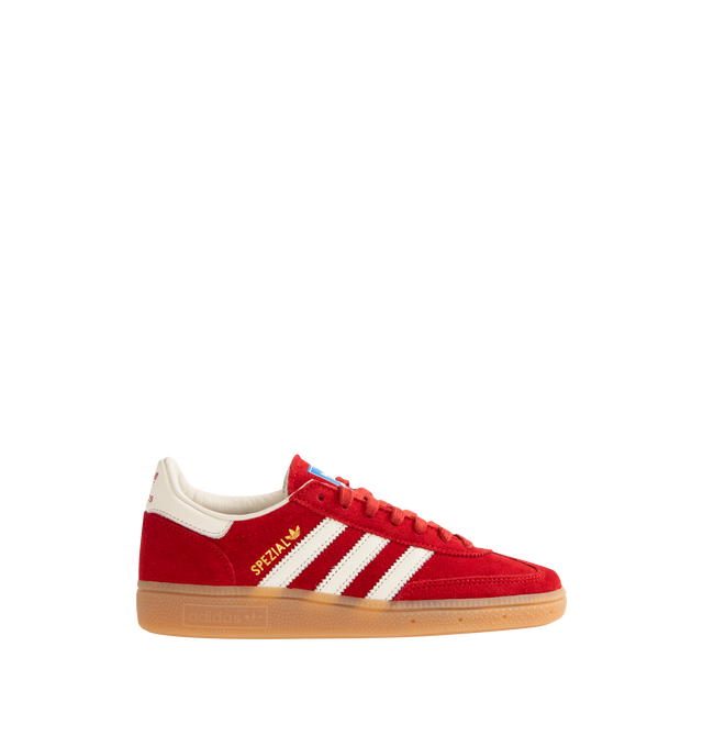 Image 1 of 5 - RED - ADIDAS Handball Spezial Sneakers featuring premium suede upper, serrated 3-Stripes and heel tab, regular fit, lace closure, leather lining and rubber outsole.