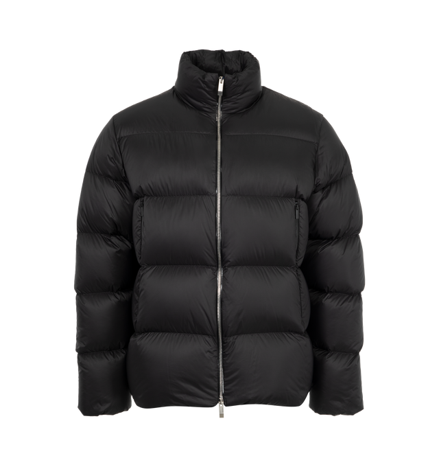 Image 1 of 3 - BLACK - Moncler Tarn Puffer Jacket has an adjustable hood, a zipper closure, zipper pockets, adjustable cuffs, an elastic hem at the back, and a silicone logo patch. Down filled. 100% polyamide. Made in Armenia.