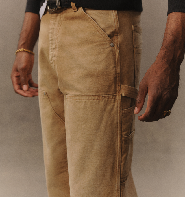 Image 8 of 8 - NEUTRAL - Cherry LA Wide Leg Double Knee Pants are crafted from durable cotton canvas and feature a wide-leg silhouette with reinforced double-knee construction. Designed with a vintage-washed finish and distressed detailing throughout, this workwear-inspired style is finished with branded nickel hardware and a signature logo label at the back pocket. Main Material: Cotton Canvas. Fit: Wide Leg. Made in Los Angeles, California.