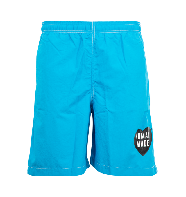 Image 1 of 3 - BLUE - HUMAN MADE Swim Shorts featuring contrast stitching, logo printed at front leg, side pockets, back welt pocket and elastic waist.