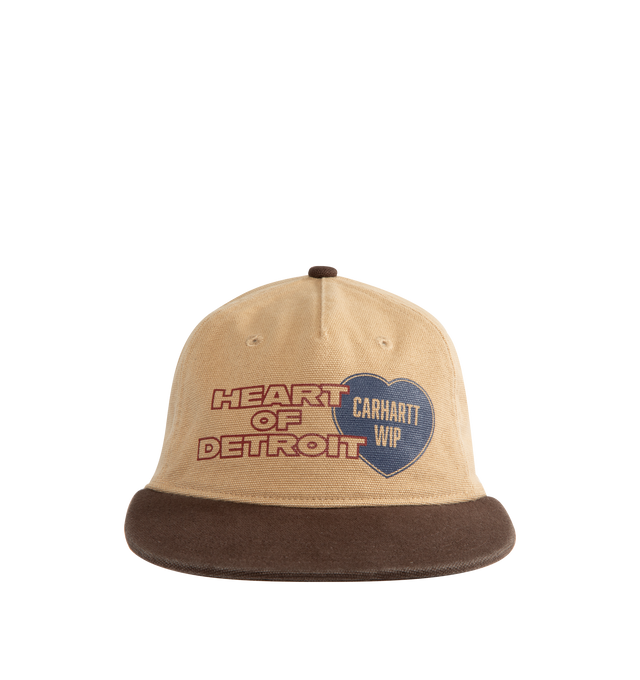 Image 1 of 3 - BROWN - CARHARTT Arcan Cap featuring lined front panel, six-panel style, firm, flat peak, unstructured, adjustable strap with metal buckle, embroidered ventilation eyelets and graphic print. 100% cotton.