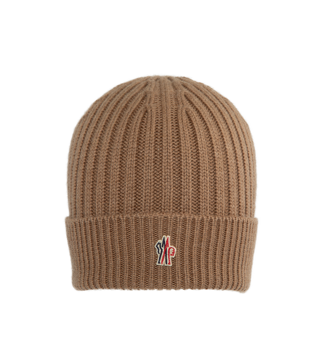 Image 1 of 2 - BROWN - MONCLER Aprs-Ski rib knit beanie hat for men crafted in pure wool rib-knitting with a cuff and an iconic tricolor logo on the front. Breathable and lightweight.100% Virgin wool.  