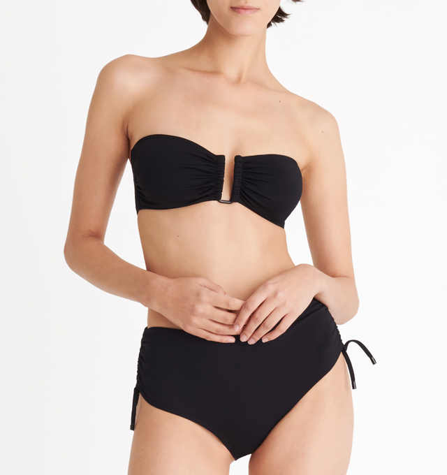 Image 4 of 6 - BLACK - ERES Show Bandeau Bikini Top featuring bust shirring at front and sides, U-shaped metal link between cups, side stays and branded large back clasp. 84% Polyamid, 16% Spandex. Made in Italy. 