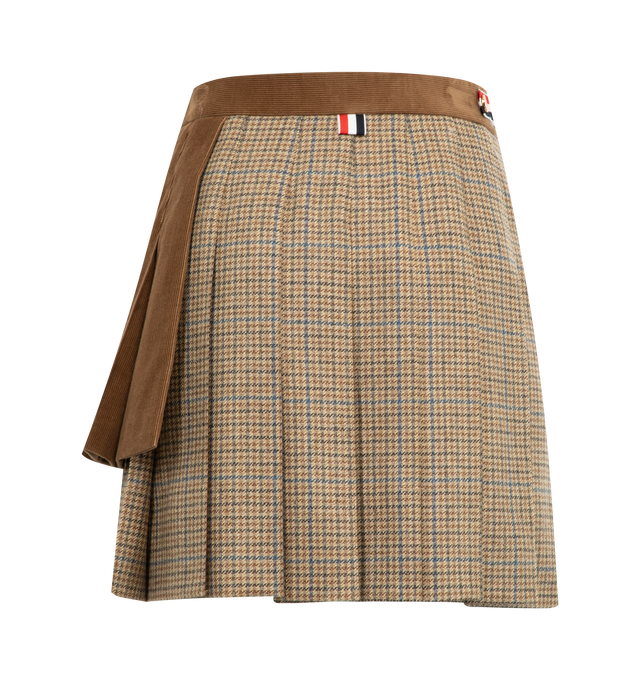 Image 2 of 2 - BROWN - THOM BROWNE Gunclub Check Cheviot Tweed Pleated Mini Skirt featuring three distinct hem lengths, a mix of Cheviot tweed and corduroy, tab front closure with striped grosgrain bow, dropped back hem with signature striped grosgrain trim and signature striped grosgrain loop tab. 100% wool. 100% cotton. Lining: 100% cupro. Made in Italy.