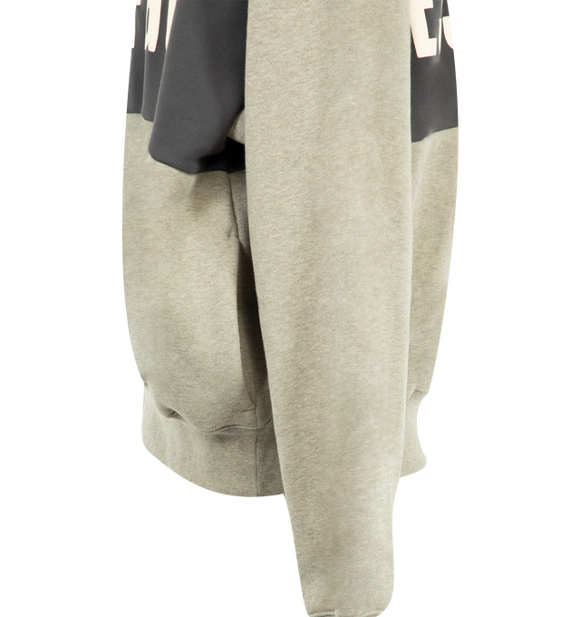 Image 3 of 3 - GREY - Fear of God Essentials Mens Cropped Relaxed Paneled Hoodie is crafted from heavyweight 380 GSM cotton-blend core fleece. Features a relaxed cropped fit, paneled construction, hood, side pockets, ribbed cuffs and hem, puff-printed Fear of God graphic at the front, puff-printed Essentials graphic at the back, and an Essentials signature label on the hood. Main Material: 80% Cotton, 20% Polyester.
