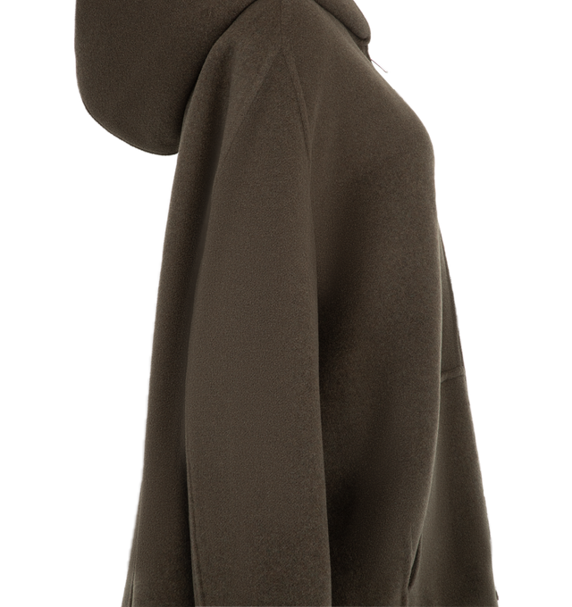 Image 3 of 3 - BROWN - Khaite Women's Hooded Wool Jacket is crafted from double-face wool and features an enveloping hooded silhouette with a bold oversized zipper pull, angled dart detailing, and twin in-seam pockets. Expertly tailored in Italy, this designer wool jacket combines exceptional craftsmanship with architectural construction and a relaxed, seasonless design for refined everyday layering. Main Material: 100% Double-Face Wool. Made in Italy.