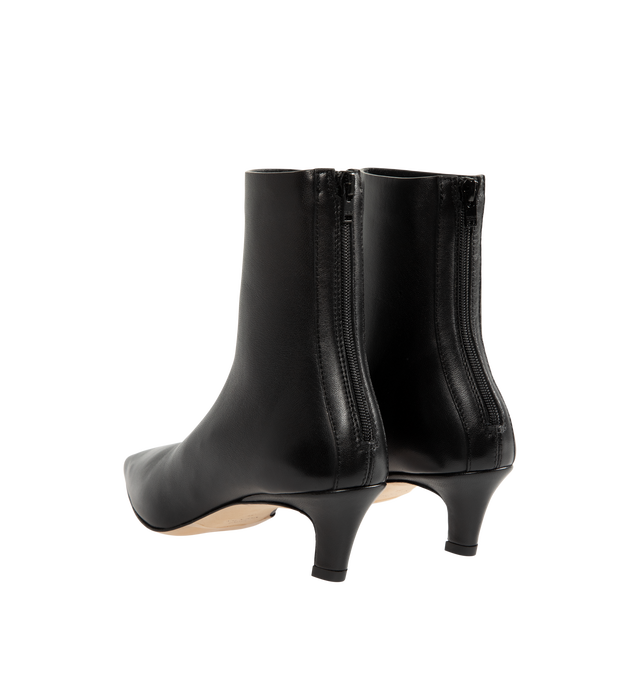 Image 3 of 4 - BLACK - Toteme Women's Nappa Mid Heel Boots are crafted from soft nappa leather and feature a minimalist, unlined construction for a second-skin fit. Designed with a sleek silhouette, they are finished with a squared pointed toe, a slanted 55mm heel, and a branded back zip fastening. Main Material: Goat Skin Leather. Lining: Sheepskin. Sole: Calf Leather. Heel Height: 55mm. Made in Italy.