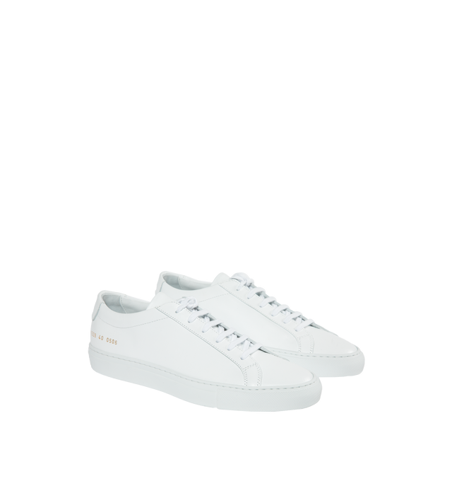 Image 2 of 5 - WHITE - COMMON PROJECTS Original Achilles Low Sneaker featuring leather upper with rubber sole and lace-up front. Made in Italy. 