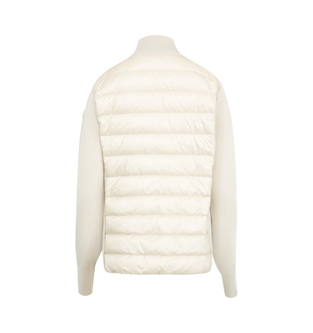 Image 2 of 3 - WHITE - MONCLER Padded Wool Zip-Up Cardigan featuring an attached drawstring hood, front zip closure, channel-quilted body, ribbed cuffs and hem, zip pockets, flap sleeve pocket, and logo patch detail. Lined body and hood. 100% polyamide/nylon. Padding: 90% down, 10% feather.