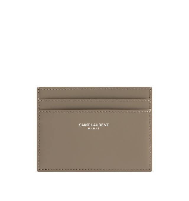 Image 1 of 3 - BROWN - SAINT LAURENT Card Case featuring embossed Saint Laurent Paris signature, leather lining, silver toned hardware and five card slots. 3.9" X 3.1" X 0.1". 100% calfskin leather.