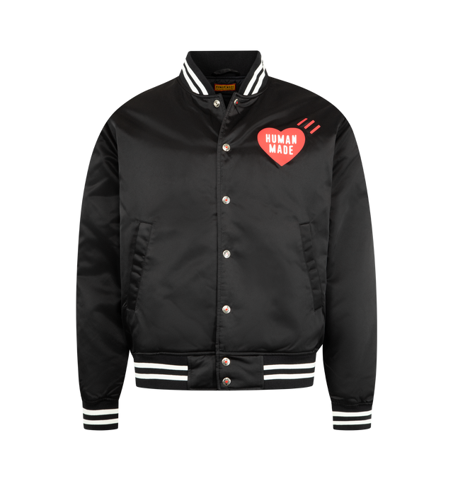 Image 1 of 3 - BLACK - HUMAN MADE Nylon Stadium Jacket featuring quilted polyester lining, ribbed collar, logo snap buttons, 2 front pockets and branding throughout. 100% nylon.