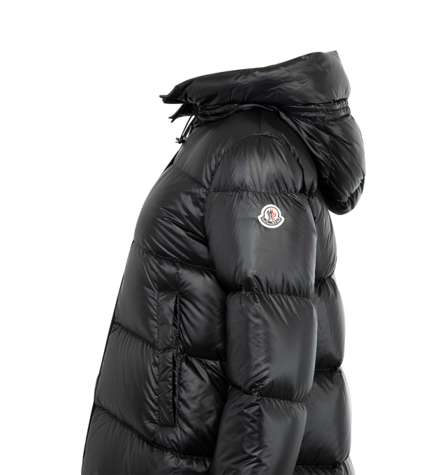 Image 3 of 3 - BLACK - MONCLER Serittes Hooded Short Down Jacket featuring recycled longue saison lining, down-filled, adjustable hood with recycled microfiber lining, zipper closure, pockets with button closure and logo patch. 100% polyamide/nylon. Padding: 90% down, 10% feather.