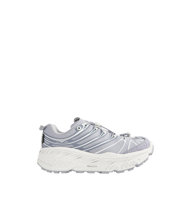 Image 1 of 5 - GREY - HOKA Stinson EVO GTX Sneaker featuring ripstop upper, nubuck toe and heel overlays, waterproof GORE-TEX bootie construction, reflective webbing heel pull, speed-lace system and secondary lace option.