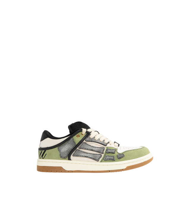 Image 1 of 5 - GREEN - AMIRI XL Skel Low Top Sneaker featuring suede and leather upper with rubber sole, lace-up closure, logo detail at tongue, cushioned collar and mesh tongue, leather bone appliques and perforated toe.