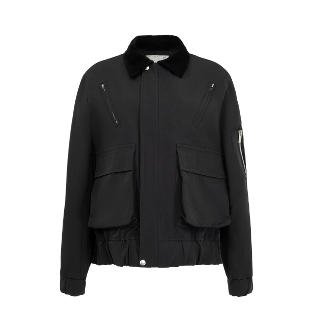 Image 1 of 4 - BLACK - Sacai Women's Grosgrain Bonding Blouson Jacket features distinct oversized front flap pockets, angled chest zip pockets, a contrasting collar, and an adjustable buttoned placket overlay. Materials: Nylon Exterior; Cotton.