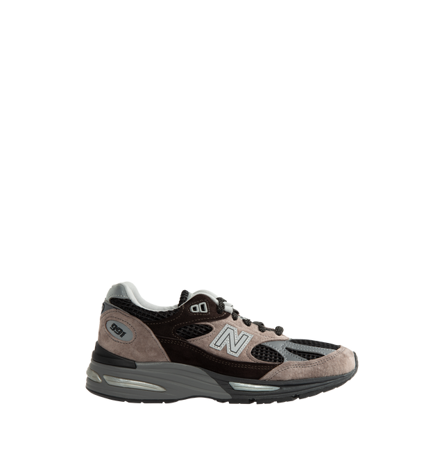 Image 1 of 5 - NEUTRAL - New Balance Unisex Made in UK 991v2 Elevated Neutrals Sneakers is crafted in pigskin suede, mesh, and synthetic materials. Full-length FuelCell cushioning is paired with semi-translucent ABZORB SBS pods and an ENCAP midsole, while reflective details, a debossed "N" logo, and embroidered tongue branding complete the design. Upper: Pigskin Suede, Mesh, and Synthetic Materials. Made in UK. *Unisex style in men's sizing.