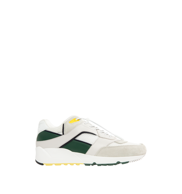 Image 1 of 5 - WHITE - SAINT LAURENT Bump Sneaker featuring low-top drawstring laced sneakers with a rubber SAINT LAURENT signature on the tongue and back tab. Calfskin, fabric. Made in Italy.