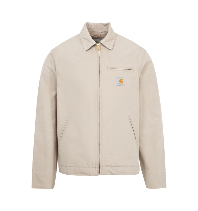 Image 1 of 3 - WHITE - CARHARTT WIP Detroit Jacket featuring front closure with zip, chest pocket with zip closure, adjustable cuffs and bottom band and square label. 100% cotton.