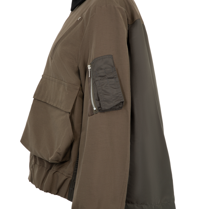 Image 4 of 4 - BROWN - Sacai Women's Grosgrain Bonding Blouson Jacket features distinct oversized front flap pockets, angled chest zip pockets, a contrasting collar, and an adjustable buttoned placket overlay. Materials: Nylon Exterior; Cotton.