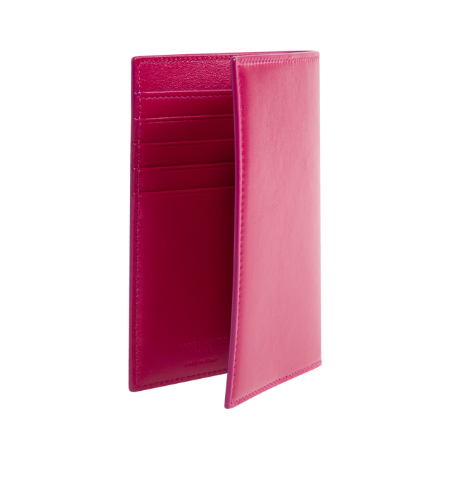 Image 2 of 3 - PINK - SAINT LAURENT Passport Case in shiny leather featuring internal card slots, leather lining, broze hardware, five card slots and two passport inserts. 3.9" X 5.5" X 0.3". Calfskin. Made in Italy.