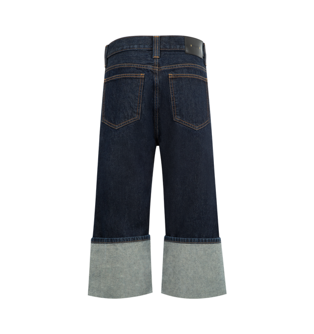 Image 2 of 3 - BLUE - KHAITE Boyle Jean featuring a dropped rise sitting low on the hip, relaxed five-pocket silhouette, cropped by wide, pressed cuffs and a button of antiqued nickel. 100% cotton. Made in the USA.