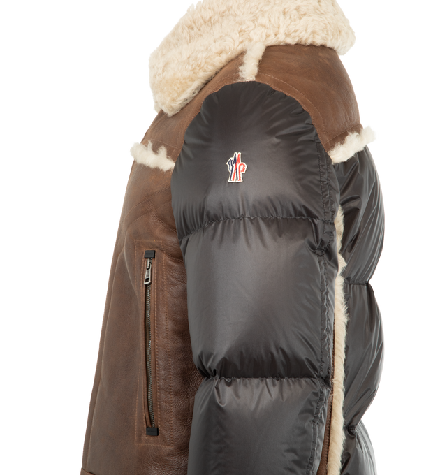 Image 3 of 3 - BROWN - MONCLER GRENOBLE Argens Leather & Shearling Short Down Jacket featuring nappa leather, polyester lining, shearling trim, down-filled, adjustable collar with buckle and snap button closure, corduroy back, zipper closure, zipped pockets and stretch jersey wrist gaiters. 98% cotton, 2% elastane/spandex. Lining: 100% polyester. Padding: 90% down, 10% feather. Made in Italy.