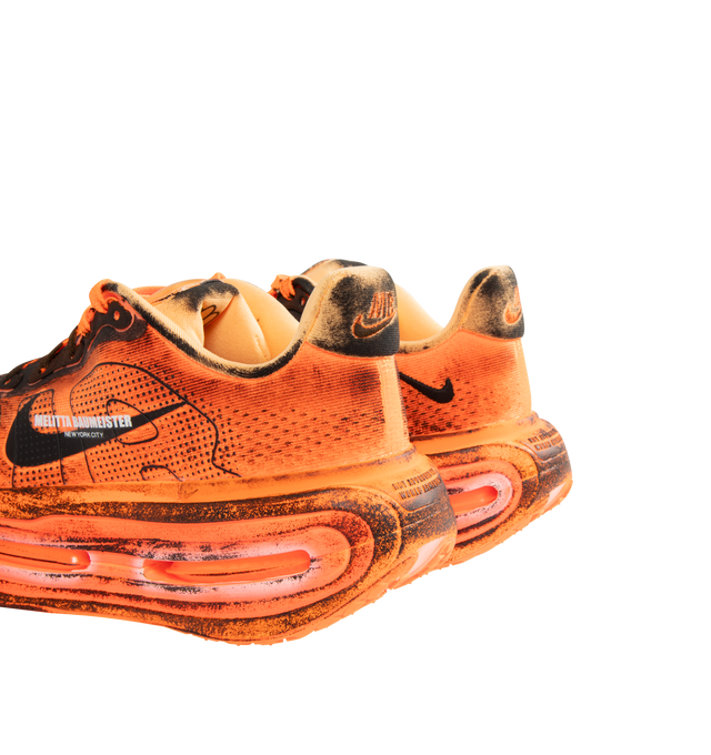 Image 3 of 5 - ORANGE - NIKE Vomero Premium x Melitta Baumeister Sneaker featuring upper with a flaming orange hue, layered with heavy black distressing for a crinkled, heat-treated look on every panel, enlarged AIR lettering and black Swoosh.