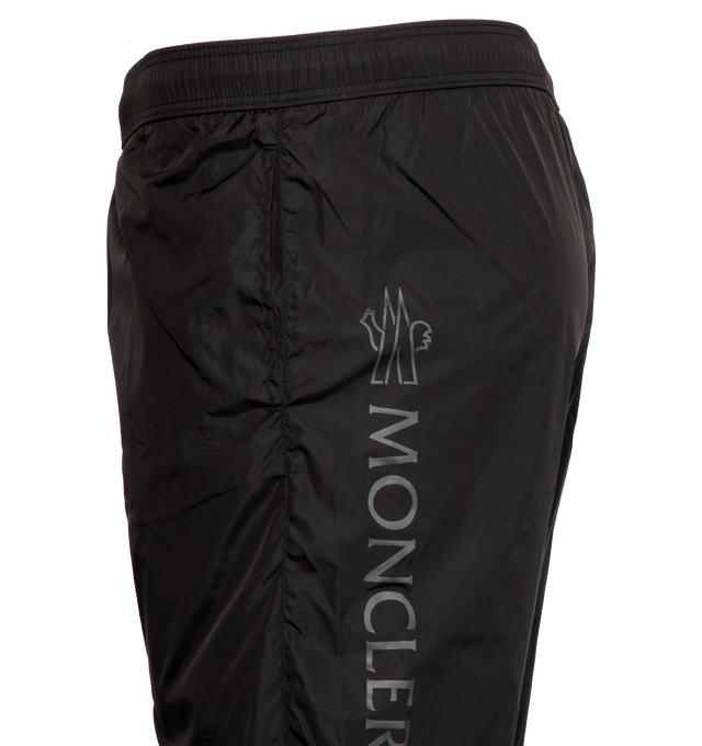 Image 3 of 3 - BLACK - MONCLER reflective lettering, interior pockets and silicone logo. 100% polyamide/nylon. Made in Bulgaria or Italy. 