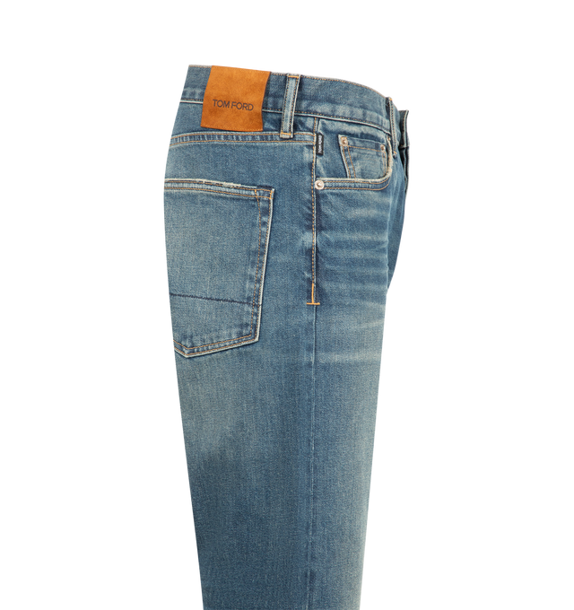 Image 3 of 3 - BLUE - Tom Ford Men's washed indigo, a 50's straight fit denim, is crafted in stretch selvedge denim. An extra comfort is added through subtle stretch, while a modern reinterpretation is given by the washed faded indigo finish with visible colour variations. Composition: 98% cotton 2% elastane. Made in the United States.