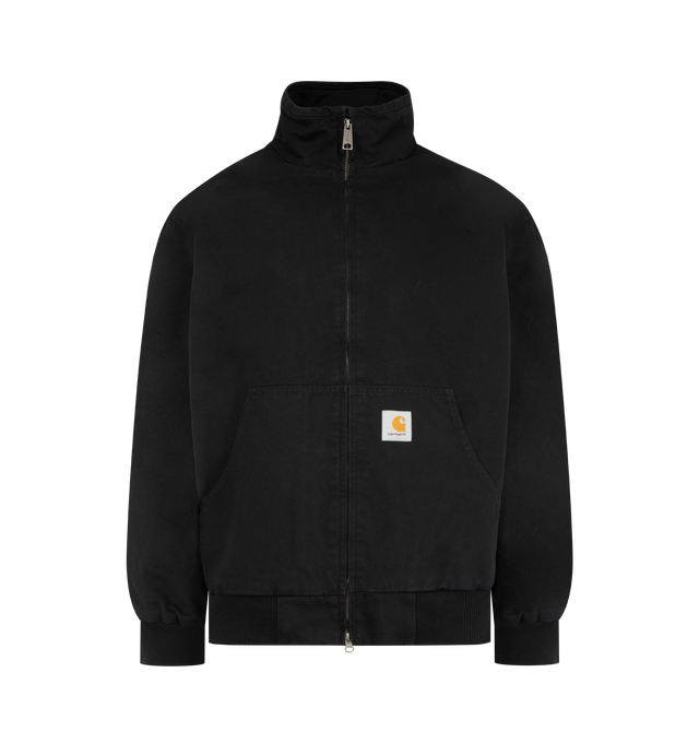 Image 1 of 3 - BLACK - CARHARTT WIP Ravon Jacket featuring a sportswear-inspired silhouette, heavyweight cotton canvas with a quilted polyester lining, two-way zip closure, a kangaroo pocket on the front, a zipped chest pocket on the inside and woven Square Label. 100% cotton.