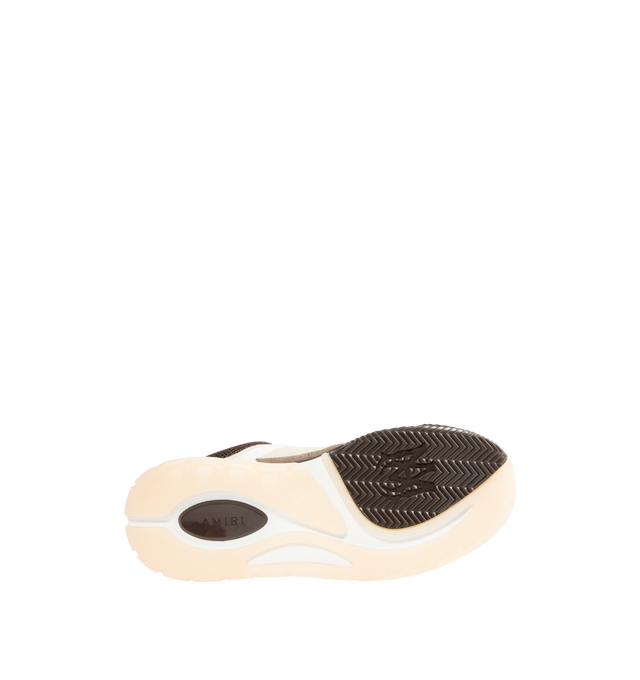 Image 4 of 5 - BROWN - AMIRI MA-1 Sneakers featuring low-top buffed leather and mesh sneakers, graphic perforations at toe, lace-up closure, logo patch at padded tongue, padded collar, logo embossed at heel counter, perforations and logo hardware at sides, terrycloth lining, logo graphic embossed at textured rubber midsole and treaded rubber sole. Upper: leather, textile. Sole: rubber.