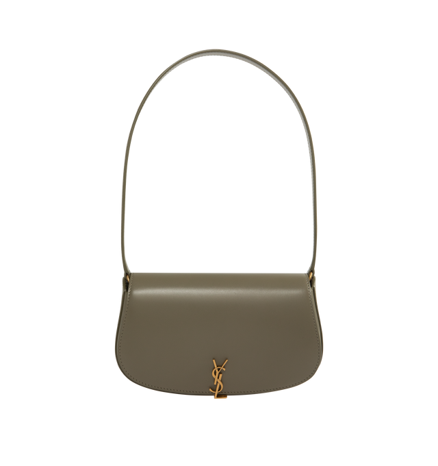 Image 1 of 3 - GREEN - SAINT LAURENT Mini Voltaire half-moon shoulder bag in calfskin with gently polished finish. Features a flap with magnetic Cassandre hinge closure and one flat interior pocket. Calfskin leather with leather lining and bronze-tone hardware. Made in Italy. Measures 8.3" X 4.3" X 1.8" with 9.4" strap drop.