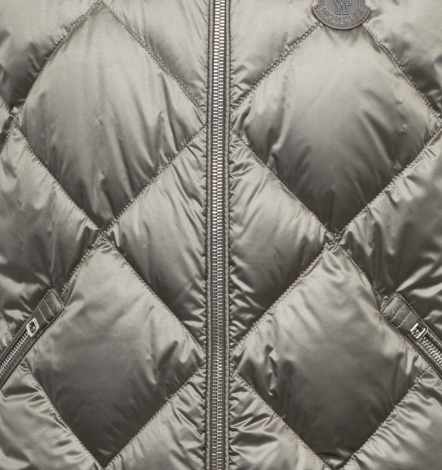 Image 3 of 3 - SILVER - MONCLER Nasta Down Vest featuring yarn-dyed nylon lger lining, down-filled, collar with snap button closure, zipper closure, zipped pockets, inner pocket with snap button closure and leather logo patch. 100% polyamide/nylon. Padding: 90% down, 10% feather. 