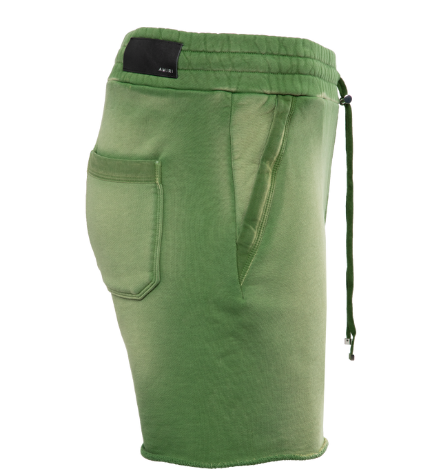 Image 3 of 4 - GREEN - AMIRI Track Shorts featuring logo at the back, logo at the back label, front logo, knee length, side pockets, back patch pocket, elasticated drawstring waist. 100% cotton.  