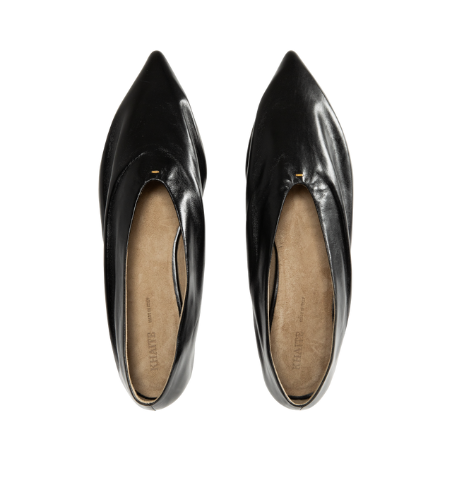 Image 4 of 4 - BLACK - Khaite Miriam ballerina flat inspired by the soft folds of fabric and crafted in Italy of glazed calfskin selected for its luminous shine. The deconstructed body is lined in cigar-hued suede, accentuating a natural fit that moves with the foot. Detailed with signature gold staple. Made in Italy. Glazed calf (100% calfskin).
