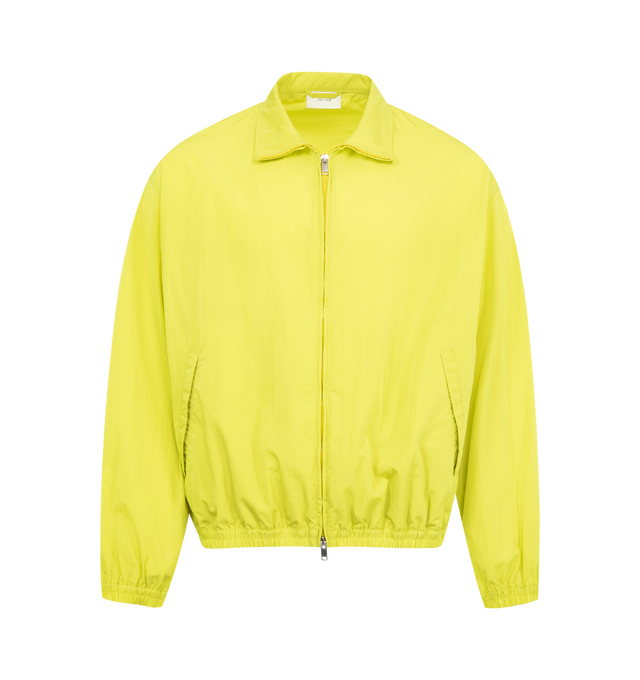 Image 1 of 2 - YELLOW - THE ROW Salvatore Jacket featuring relaxed bomber jacket in fluid technical nylon with elasticated cuffs and hem, front welt pockets, and front two-way zip closure. 100% nylon. Made in Italy.