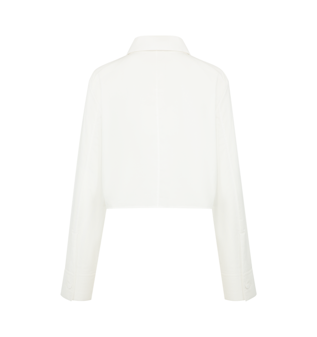 Image 2 of 2 - WHITE - KHAITE Jasen Top featuring a button-up designed for a more straight and open fit with shrunken cuffs, covered buttons at the placket and single-button cuffs. 100% cotton.