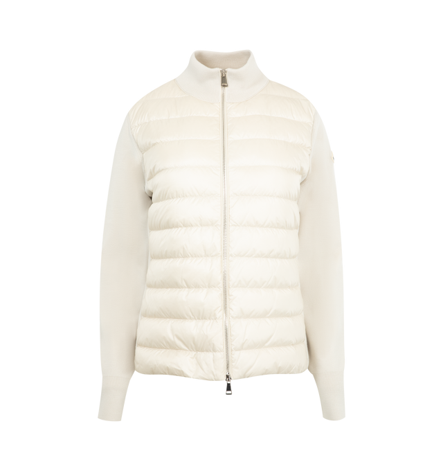 Image 1 of 3 - WHITE - MONCLER Padded Wool Zip-Up Cardigan featuring an attached drawstring hood, front zip closure, channel-quilted body, ribbed cuffs and hem, zip pockets, flap sleeve pocket, and logo patch detail. Lined body and hood. 100% polyamide/nylon. Padding: 90% down, 10% feather.