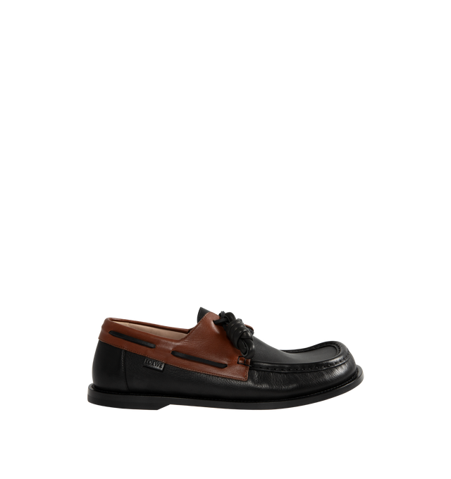 Image 1 of 4 - BROWN - Loewe Men's Campo Boat shoe in two-tone soft calfskin featuring the LOEWE signature round toe shape and a hand-sewn construction with a supple leather lining and flexible sole. Features 20mm heel, squared leather lace closure, padded leather insole, rubber-injected leather outsole, removable Flamenco knot and LOEWE embossed tag placed at the side. Made in Italy.