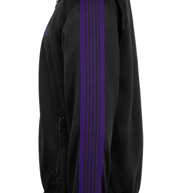 Image 3 of 3 - BLACK - Needles Men's Track Jacket is crafted from smooth polyester jersey and features the brand's signature Papillon embroidery, a front zip closure, and a relaxed-fit silhouette. Designed with excellent stretch and breathability, this sportswear-inspired style is finished with zip pockets for everyday functionality. Main Material: 100% Polyester. Made in Japan.